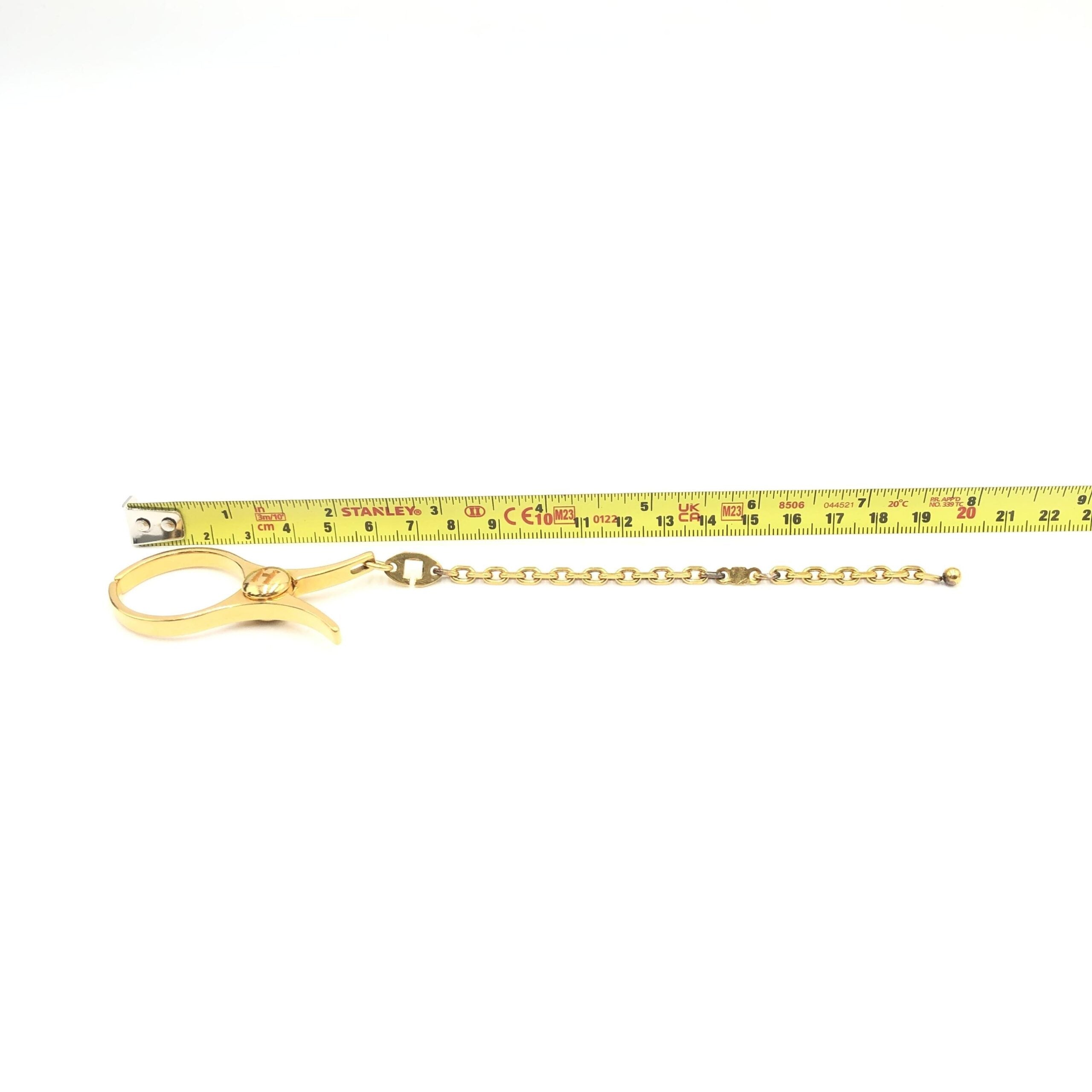 Hermès Gold Metal Glove Holder Keychain